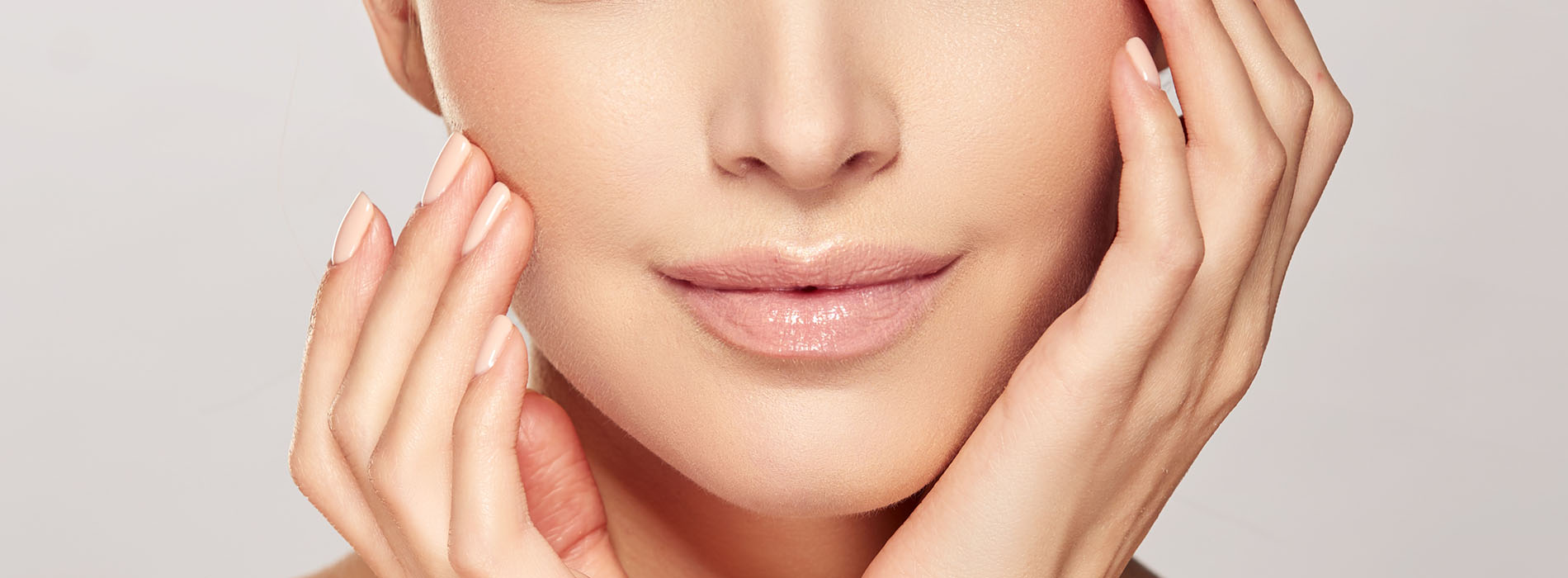 The image features a close-up of a person s face with their hands resting on their cheeks, emphasizing their skin care routine.